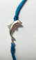 Preview: Blaues Armband mit einem silbernen Delfin